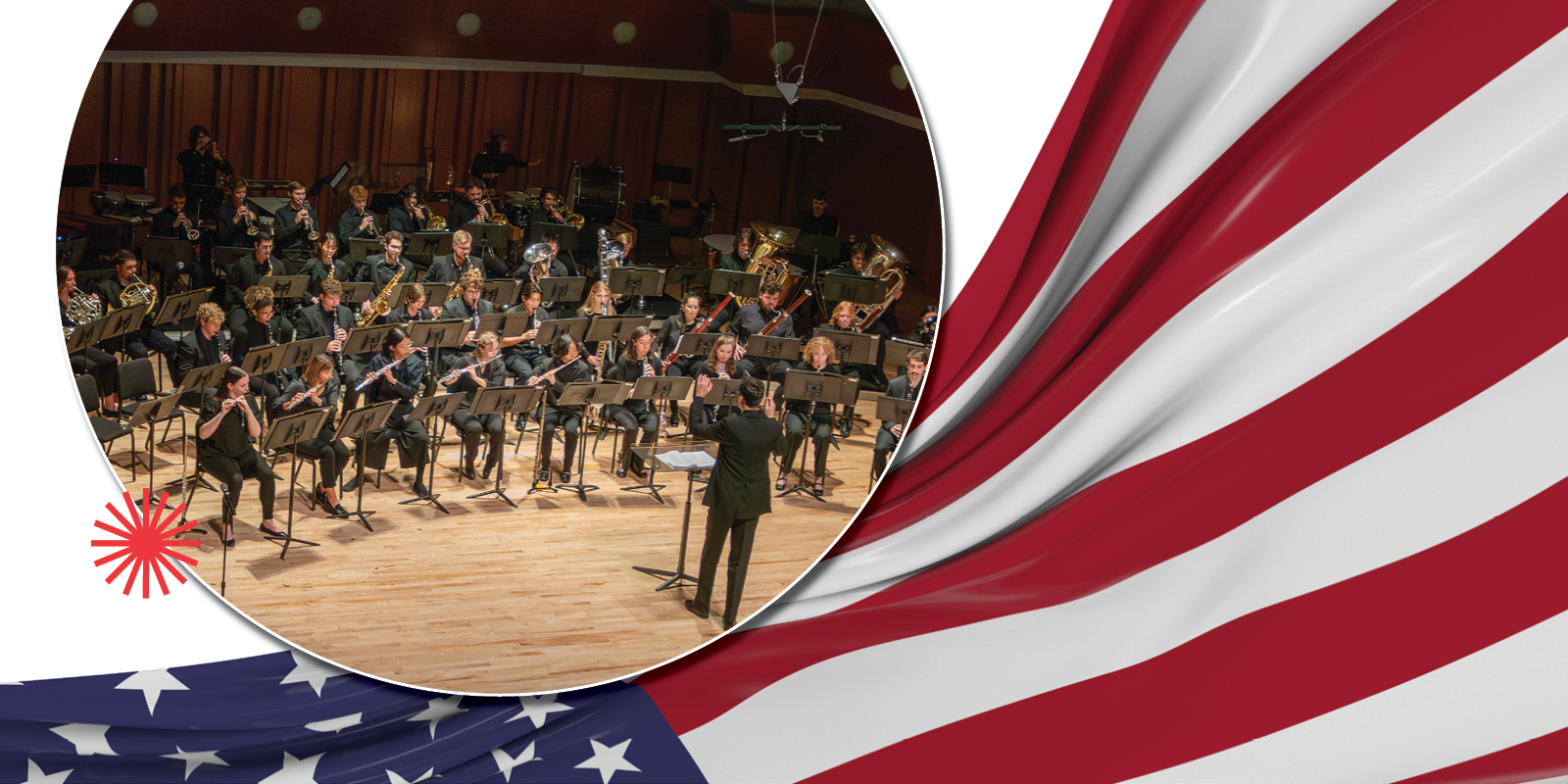 A conductor leads a large concert band on stage; the scene is framed by a waving American flag motif along the images edge.